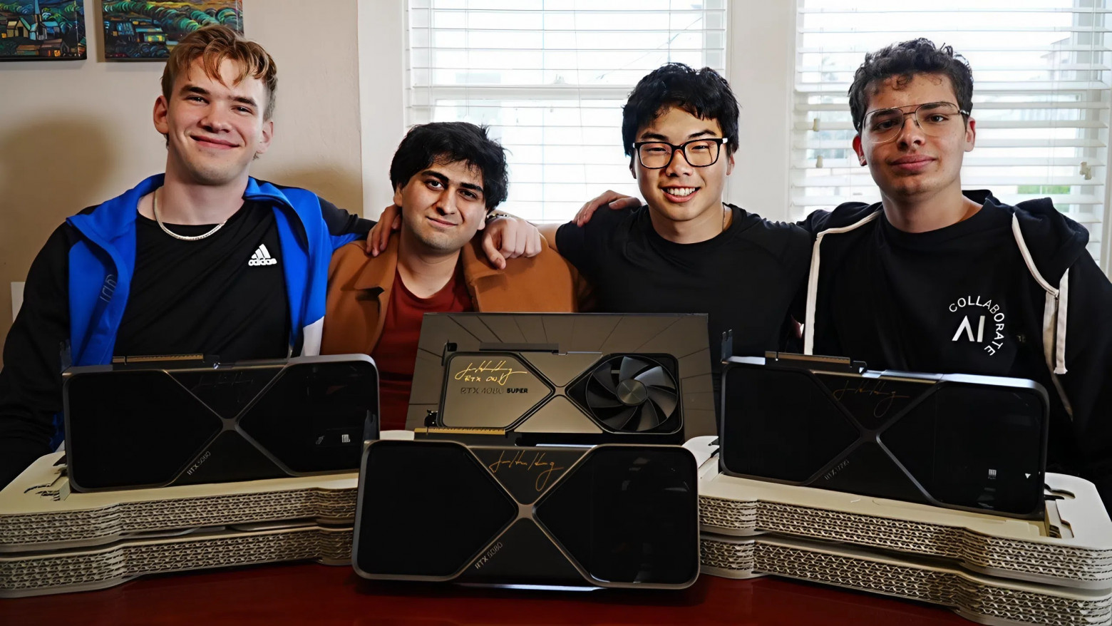 Максим (первый справа) и его команда