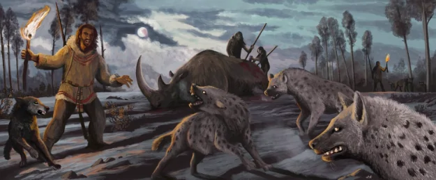     Группа охотников-людей, выследив и завалив крупного шерстистого носорога (Coelodonta antiquitatis), теперь должна защищать его от стаи голодных гиен (Crocuta crocuta). По левую руку - ранняя домашняя собака или протособака (Canis lupus familiaris). Иллюстрация: Hodari Nundu.