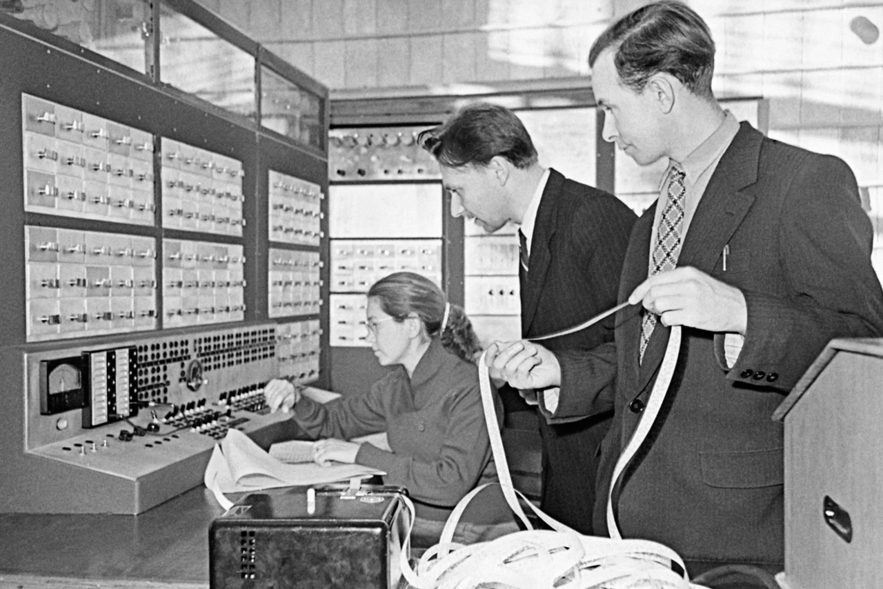 USSR state-owned publisher "Sputnik". https://www.alamy.com/stock-photo-scientific-staff-members-working-on-the-computing-machine-setun-22818602.html